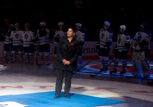 File: Angela James stands on centre ice in front of the Toronto Maple Leafs team after being inducted into the Hockey Hall of Fame before Toronto Maple Leafs and Buffalo Sabres NHL hockey action in Toronto on Saturday November 6, 2010.