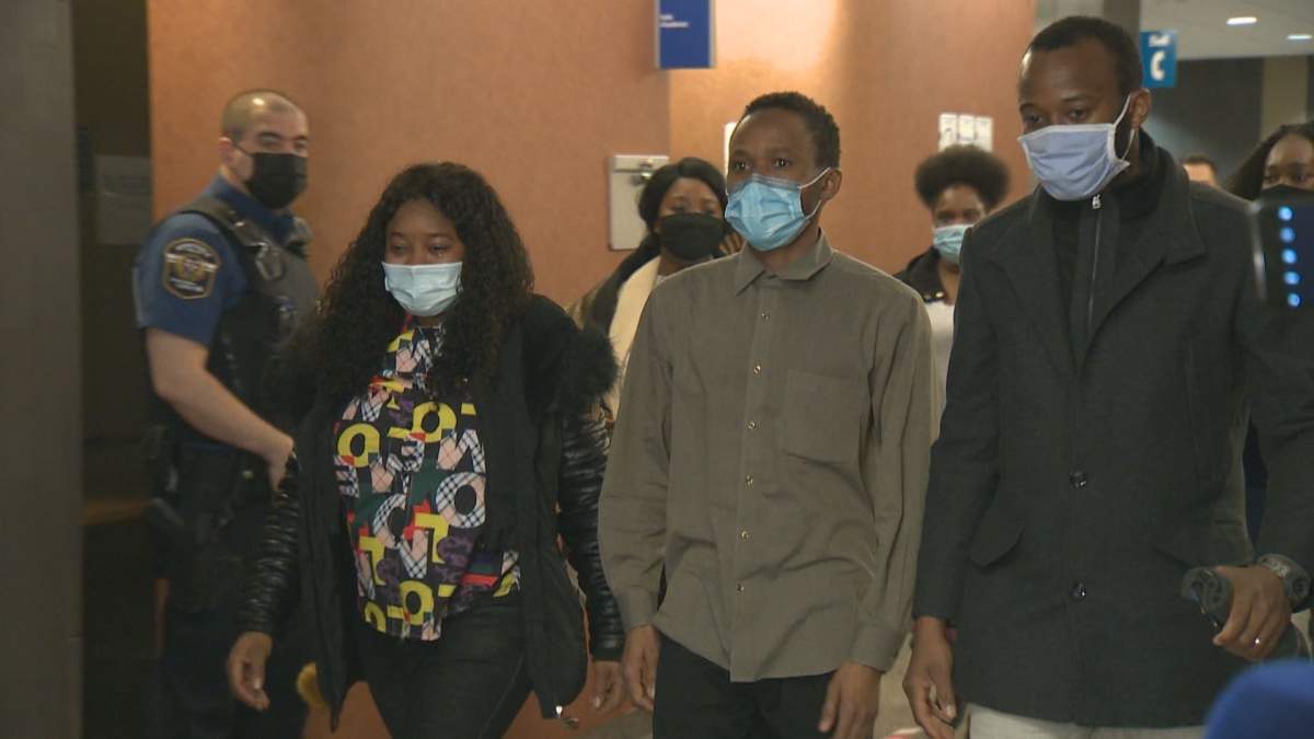 Mamadi Fara Camara and his family at the Montreal courthouse.