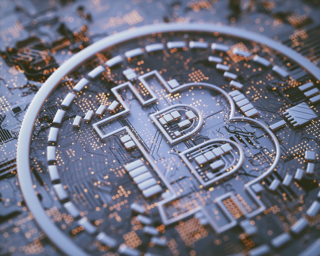 Bitcoin logo on circuit board, illustration.