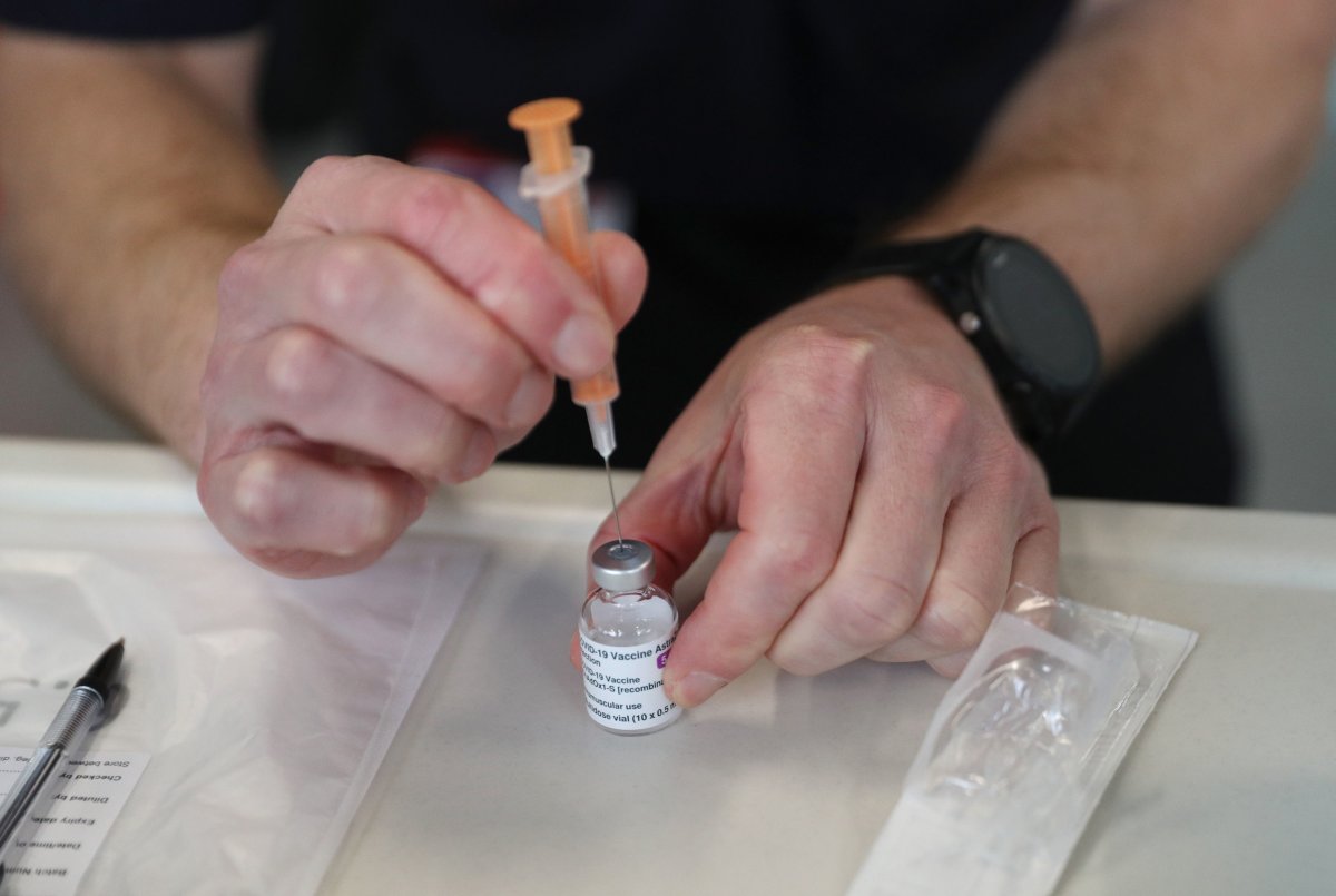 File: A dose of the Oxford/AstraZeneca coronavirus vaccine is prepared in Basingstoke, United Kingdom.