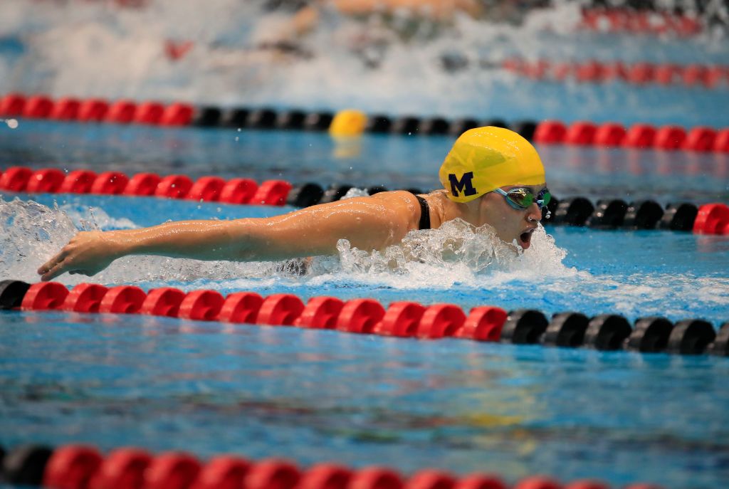 Maggie MacNeil swims to victory in her heat of the Woman 100 Meter Butterfly during the 2020 Toyota US Open Championship -Indianapolis on Nov. 13, 2020 in Indianapolis, Indiana. 