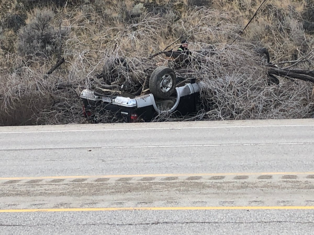 A vehicle rolled over into the ditch along Highway 97 near Summerland. 
