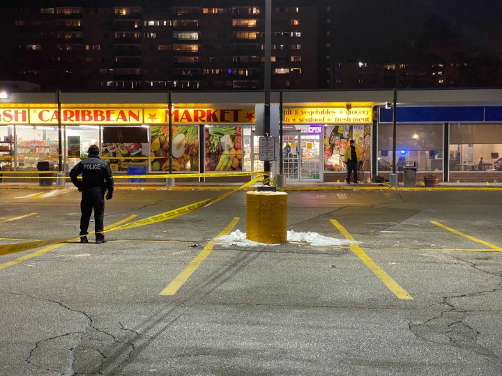 Police investigate a shooting in Etobicoke on Friday.