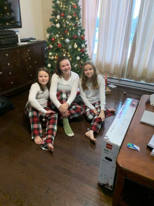 Lexi Dakin (right) is seen with two of her sisters. Submitted by Chris Daken