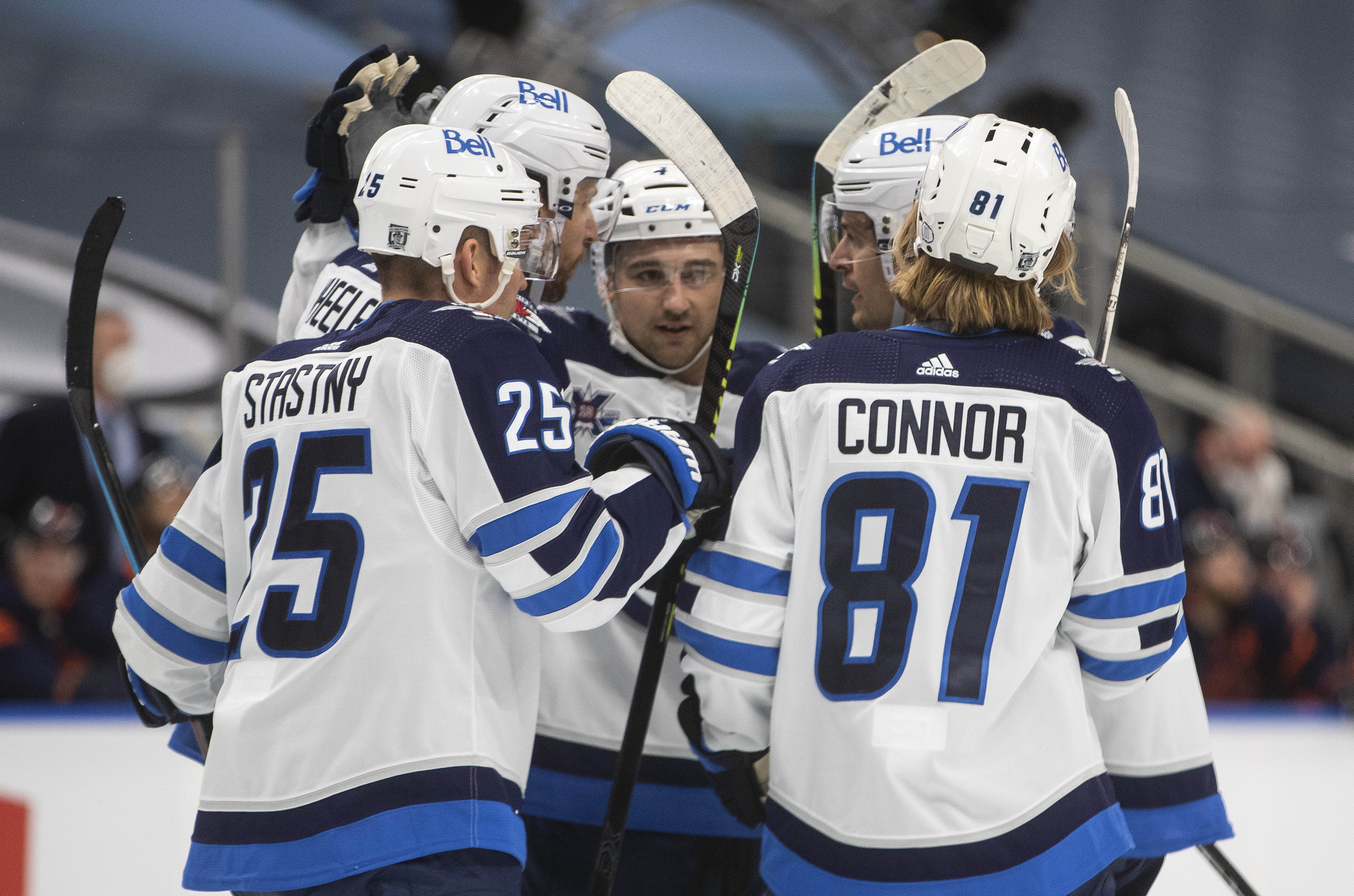 Hellebuyck, Pionk, Connor lead Jets to 2-1 win over Oilers - The