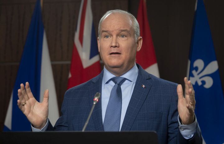 Leader of the Opposition Erin O'Toole gestures as he responds to a question from a reporter during a news conference on Parliament Hill in Ottawa, Thursday February 4, 2021. 