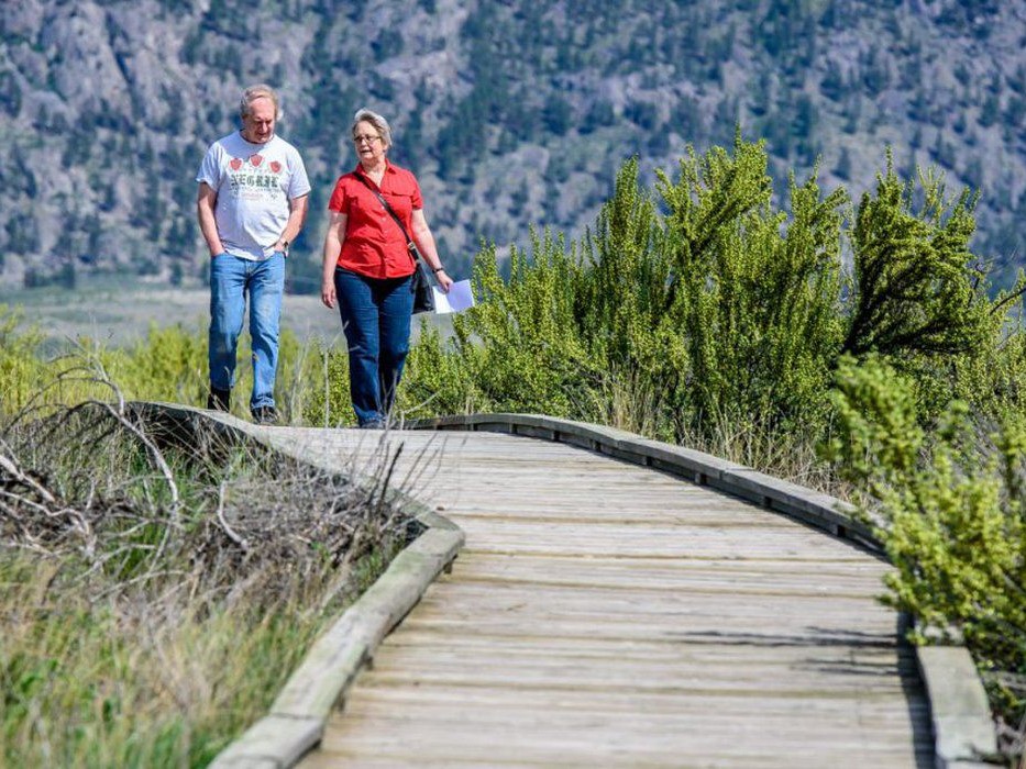 File photo: A couple walking along the boardwalk at the Osoyoos Desert Centre. A provincial grant of $834,789 will go towards replacing the 1.5-kilometre boardwalk.