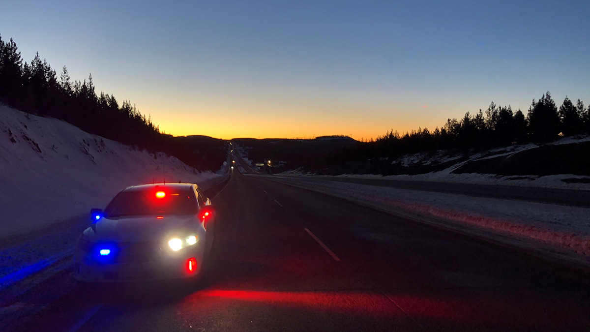A photo of a police cruiser along the Coquihalla Highway. RCMP are asking motorists to be cautious along mountain passes, as road conditions can quickly change.