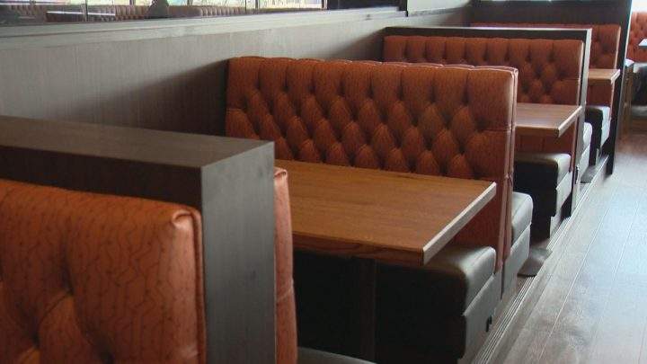 Empty booths are seen at the Rotisserie buffet in Regina. 