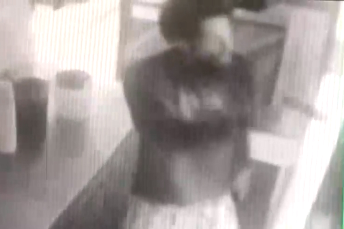 This image from security footage shows a gunman at a Roscoe’s Chicken and Waffles in Pasadena, Calif., on Feb. 3, 2021.