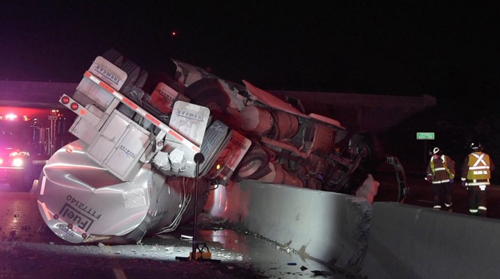 A photo of the transport truck filled with wine rollover on Highway 401 near Highway 6.