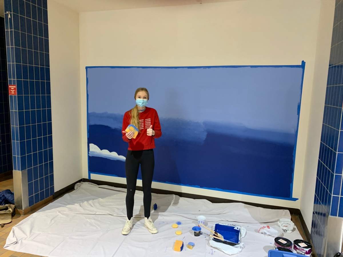 Muriel Charlebois, 14, painted a HOPE mural at the COVID-19 testing site at Calgary’s old Greyhound bus station.