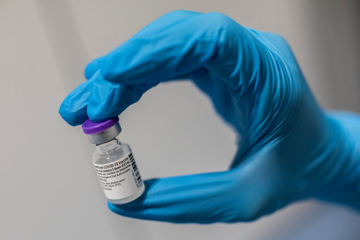 A nurse holds a bottle of the Pfizer-BioNTech COVID-19 vaccine. Monday, Feb. 1, 2021. (AP Photo/Bernat Armangue).