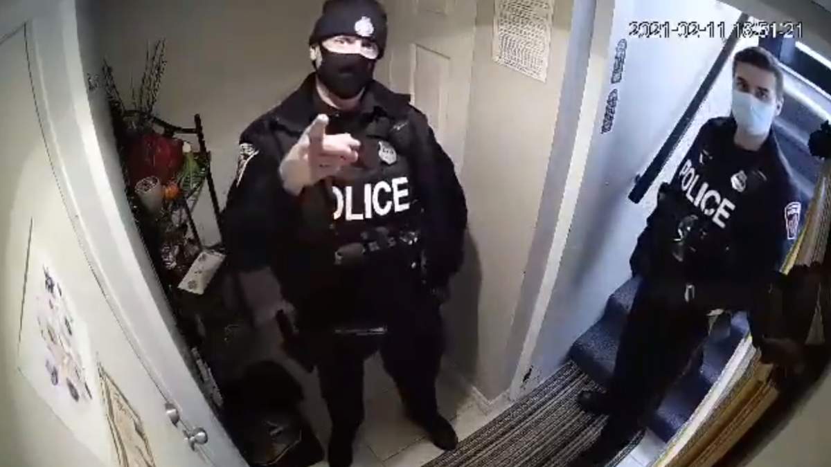 Hamilton police say they have forwarded a video to their professional standards department in which an officer lunged at a woman amid a call related to a dispute with a neighbour on Feb. 11, 2021.