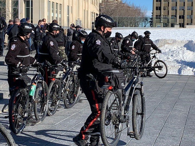 Police at the Alberta legislature on Saturday, Feb. 20, 2021.