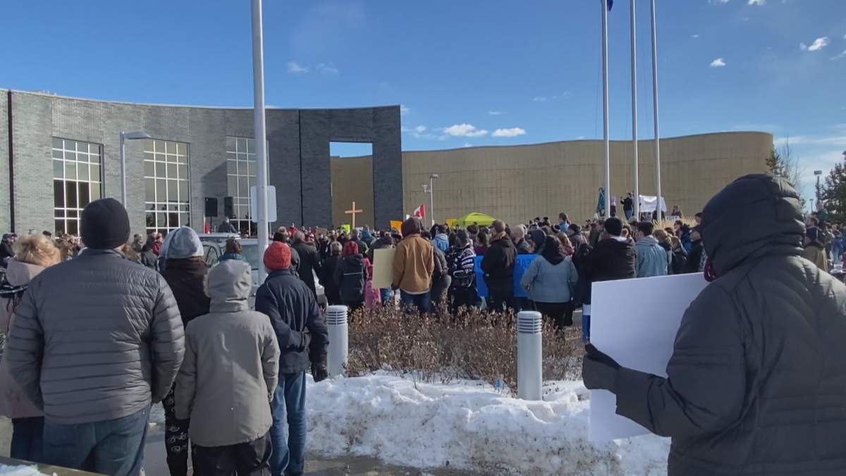 Protesters outside the Edmonton Remand Centre on Saturday, Feb. 20, 2021.