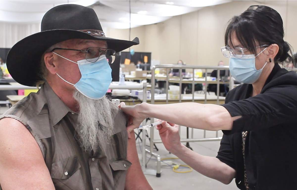 Paul Burgoyne, born in 1957, receives the Covishield/AstraZeneca vaccine on Thursday, March 11, 2021.