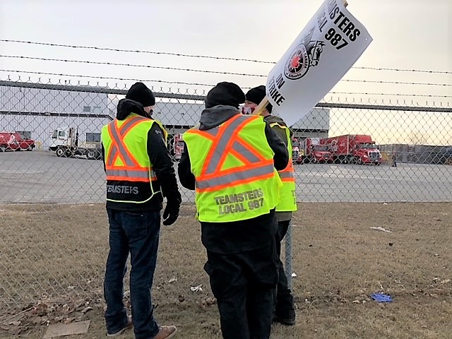 Union workers at Calgary Coca-Cola plant walk off the job - image