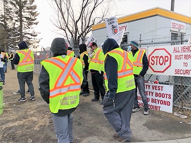 Members of Teamsters Local Union 987 of Alberta at the Coca-Cola plant in northeast Calgary walked off the job on Monday, March 15, 2021.