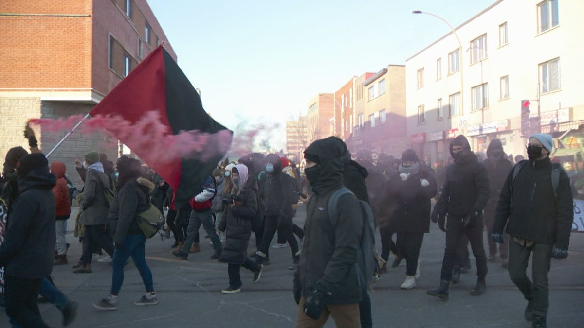 Protesters march through Montreal to denounce police brutality. Monday, March, 15, 2021.