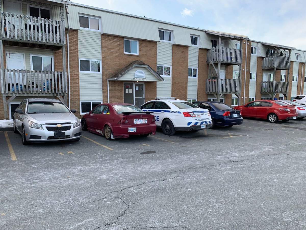 Police attend the scene of a suspicious fire at an apartment complex in Bedford on Tuesday, March 2, 2021. 