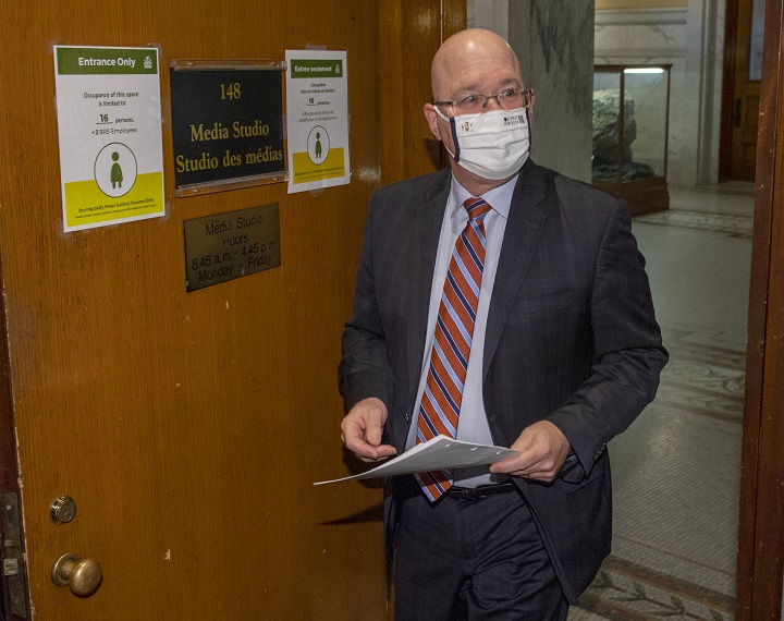 Minister of Municipal Affairs and Housing Steve Clark arrives to make an announcement in the Ontario Legislature, in Toronto, Monday, Dec. 7, 2020. 
