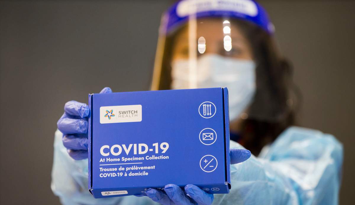MISSISSAUGA (CANADA), Feb. 22, 2021  A medical worker shows a COVID-19 At-Home Specimen Collection kit at Toronto International Airport in Mississauga, Ontario, Canada, on Feb. 22, 2021. Starting from Monday, travelers arriving in Canada by air are required to take a COVID-19 molecular test before they exit the airport. They are also required to quarantine for three days at a government-designated hotel at their own expense until they get a result. (Photo by Zou Zheng/Xinhua) (Credit Image: © Zou Zheng/Xinhua via ZUMA Press).