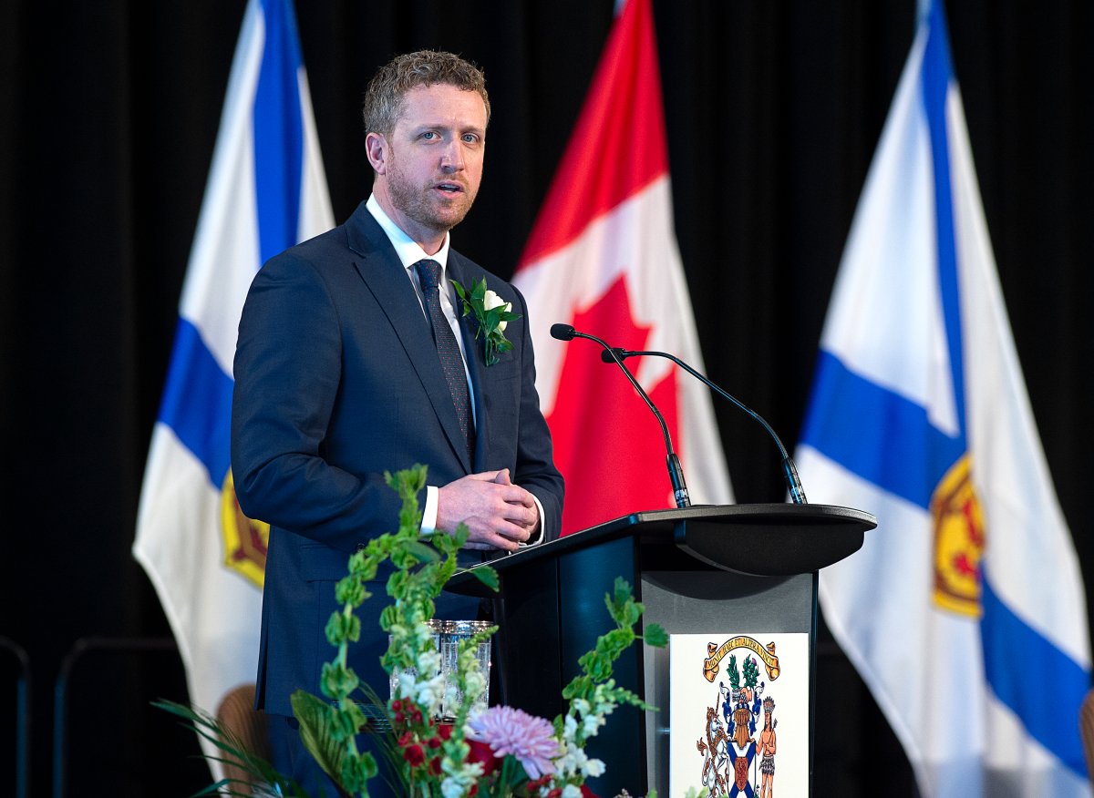 Nova Scotia Premier Iain Rankin addresses the audience after taking his oath of office in Halifax on Tuesday, Feb. 23, 2021.