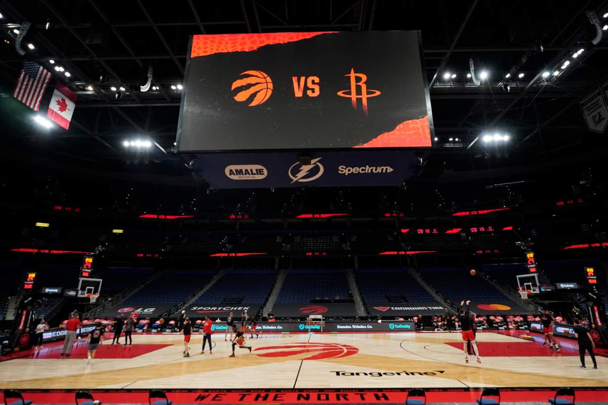 Some members of the Toronto Raptors and Houston Rockets take part in a shoot around before an NBA basketball game Friday, Feb. 26, 2021, in Tampa, Fla. 