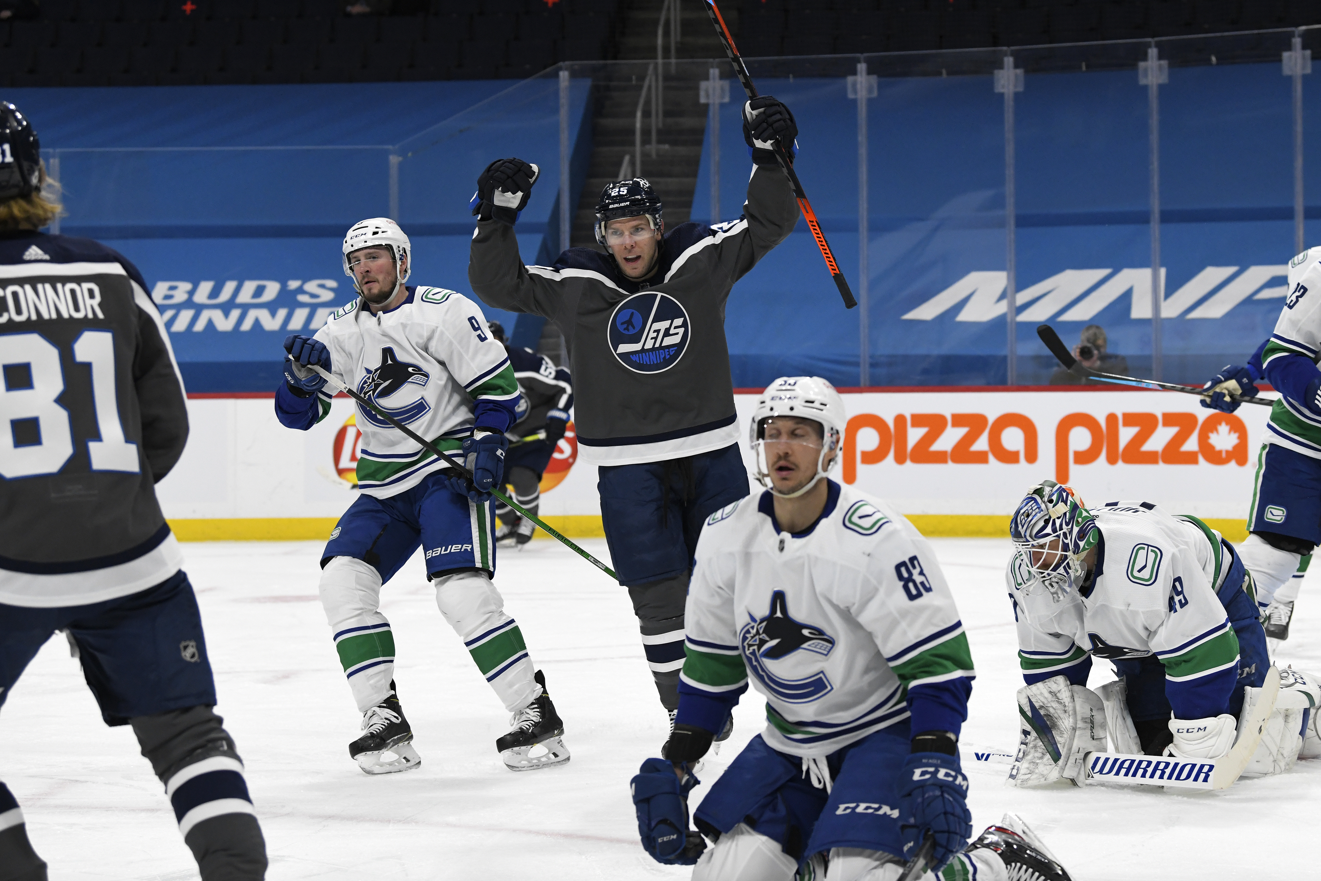 COVID sidelines Canucks, two Jets games postponed