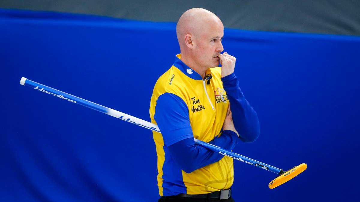 Team Wild Card Two skip Kevin Koe watches the action as he plays Team Newfoundland and Labrador  at the Brier in Calgary, Alta., Saturday, March 6, 2021.