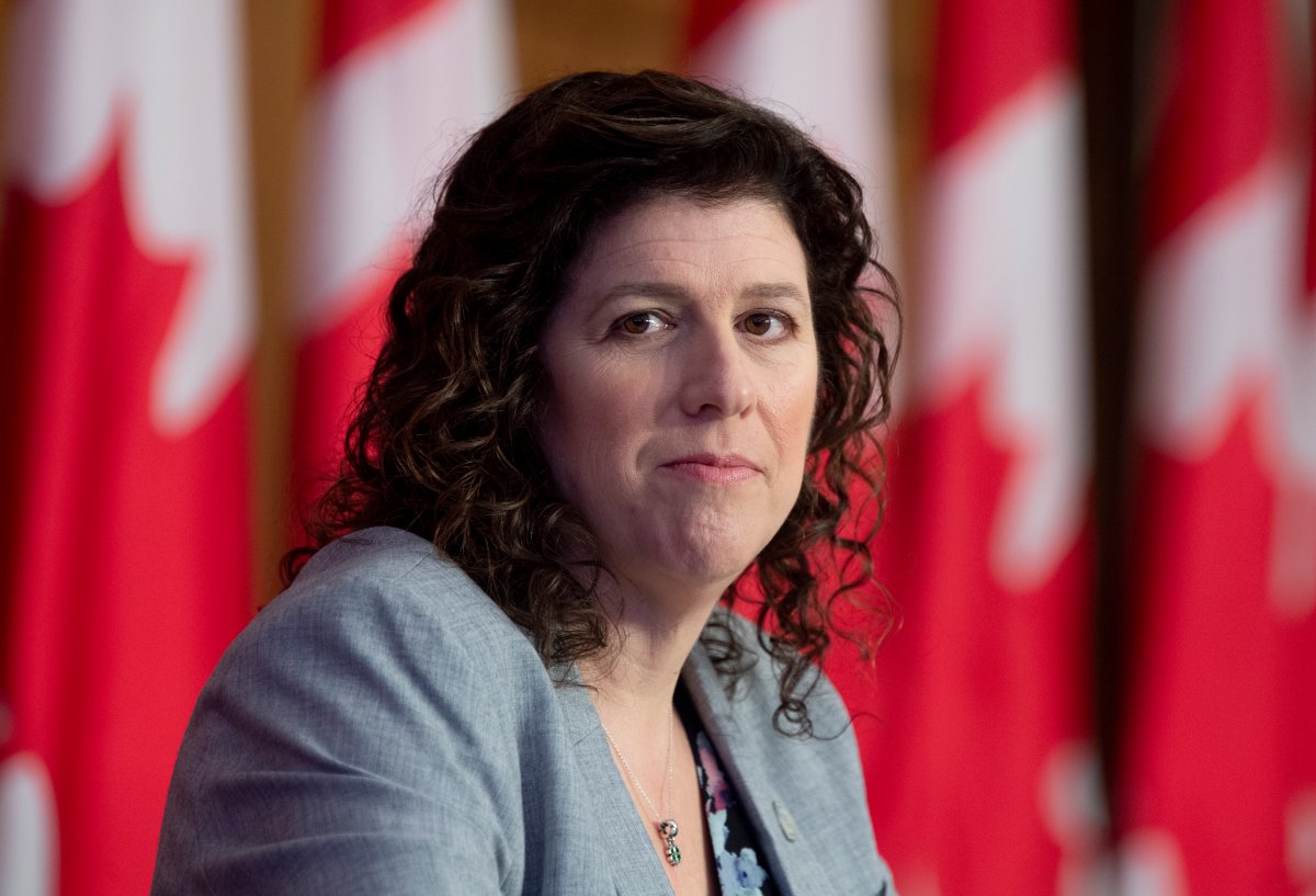Auditor General Karen Hogan listens to a question during a news conference following the tabling of reports in Ottawa, Thursday March 25, 2021. 