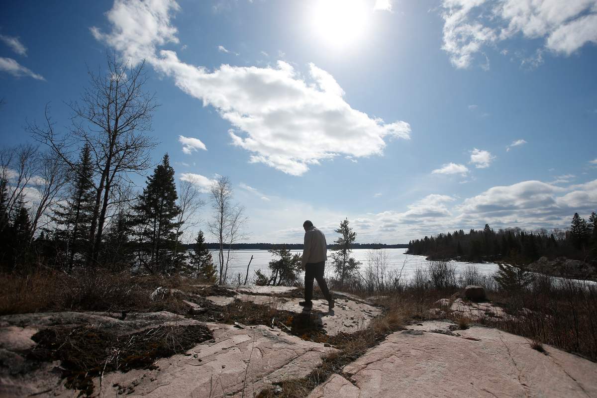 Gerald Lewis, chief of the Anishinaabe community Shoal Lake 39 in Northwest Ontario, walks in his community near Shoal Lake.
