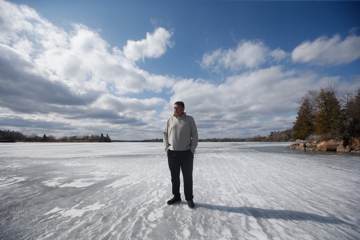 Gerald Lewis, chief of the Anishinaabe community Shoal Lake 39 in Northwest Ontario, walks on the ice of Shoal Lake Saturday, March 27, 2021. Shoal Lake is Winnipeg’s water source and the Shoal Lake 39 community is hoping recent favourable developments in their $500-million lawsuit against the city and the province of Ontario will tilt the odds their way. 
