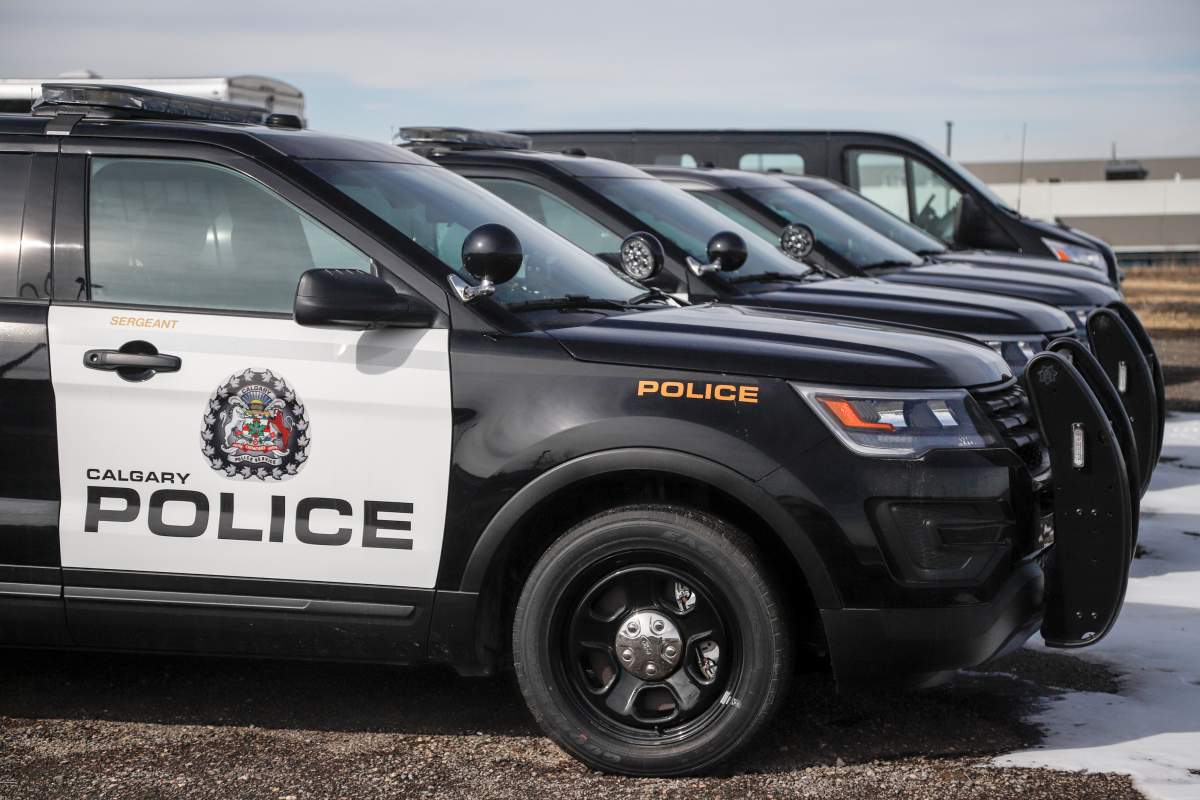 Cruisers at Calgary Police Service headquarters on Thursday, April 9, 2020.