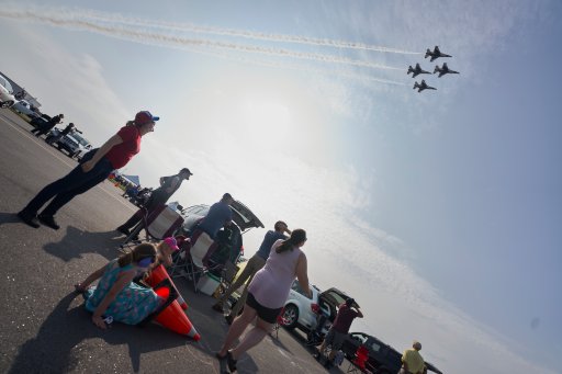 Spectators watch the USAF Thunderbirds perform during Skydrive, a physically distanced drive-in airshow put on by Airshow London at the London International Airport in London, Ont., on Saturday, Sept. 12, 2020.