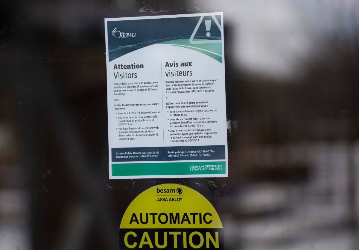 Signage at Lansdowne Park in Ottawa advises residents to delay visiting city facilities amid the COVID-19 pandemic. A shift to Ontario's red zone will indefinitely delay a planned outdoor concert at Lansdowne for later in the month.