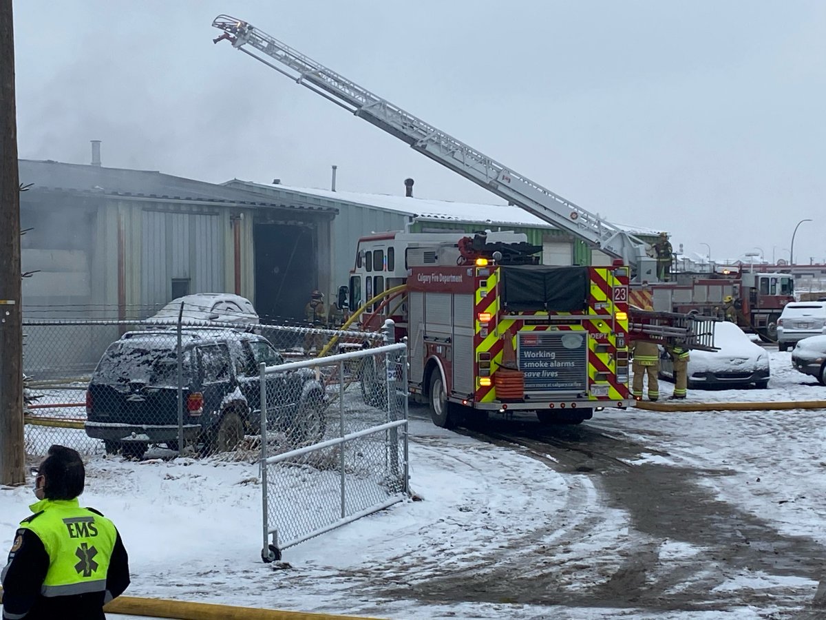Emergency crews at the scene of an industrial fire in southeast Calgary on Thursday. 
