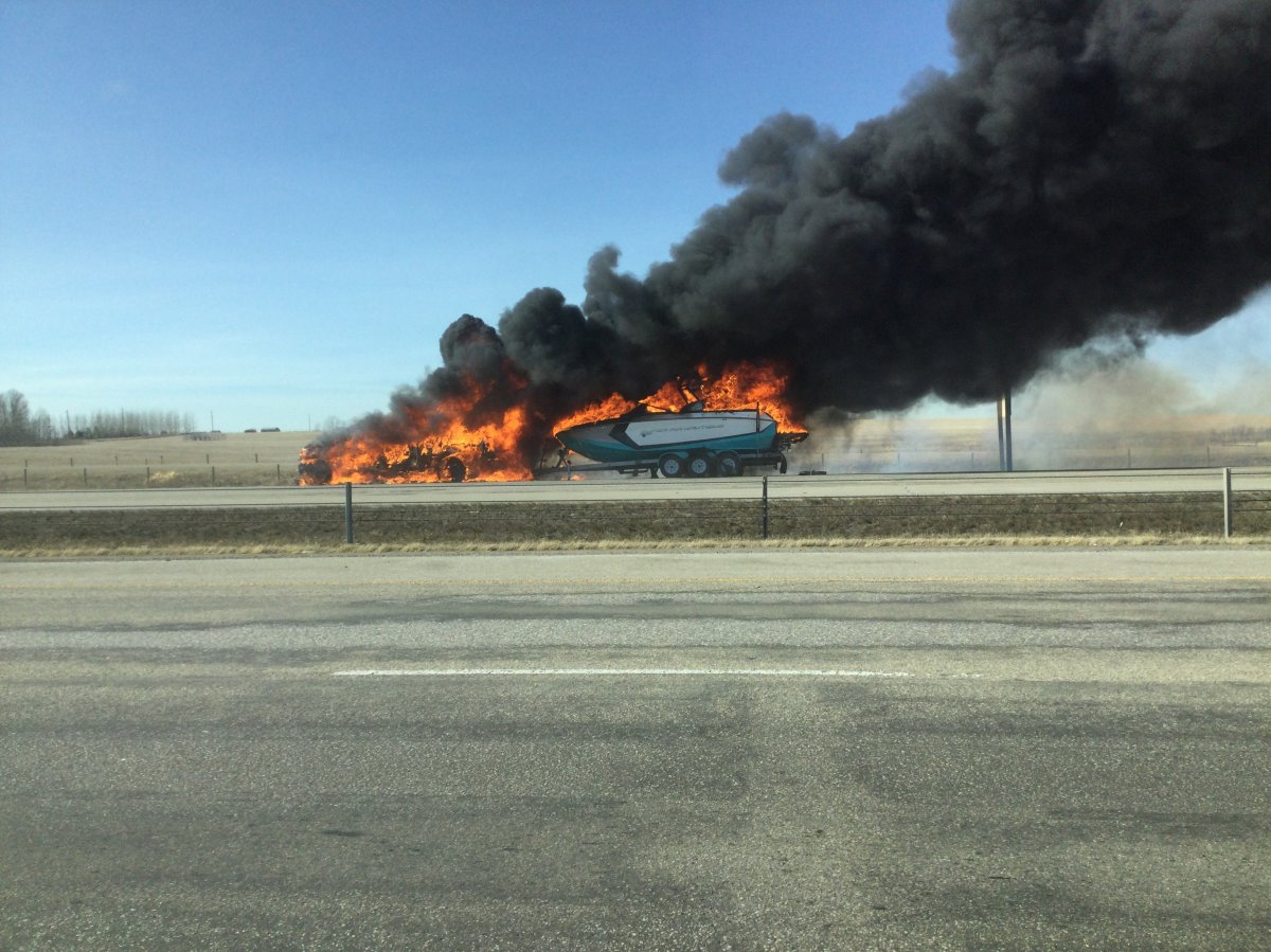 A truck and trailer fire shut down traffic along a portion of Highway 2 on Wednesday evening. 