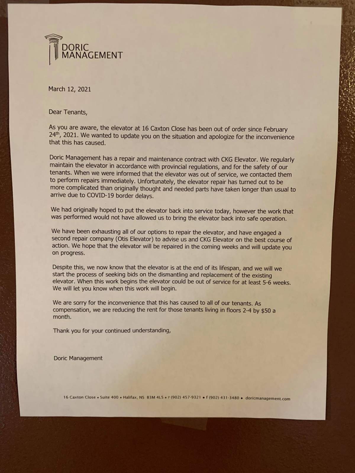 A letter notice from Doric Management says elevator repair may take weeks.