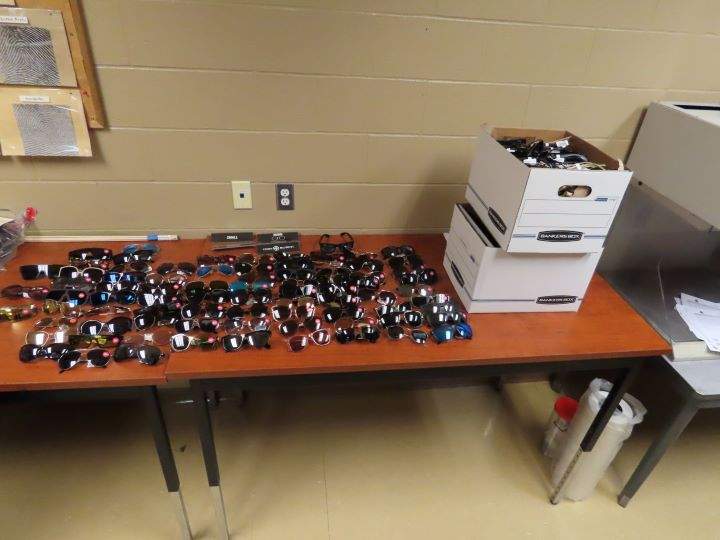 South Simcoe police say they've charged two people after stolen sunglasses were recovered in connection with an investigation into six commercial break-ins.