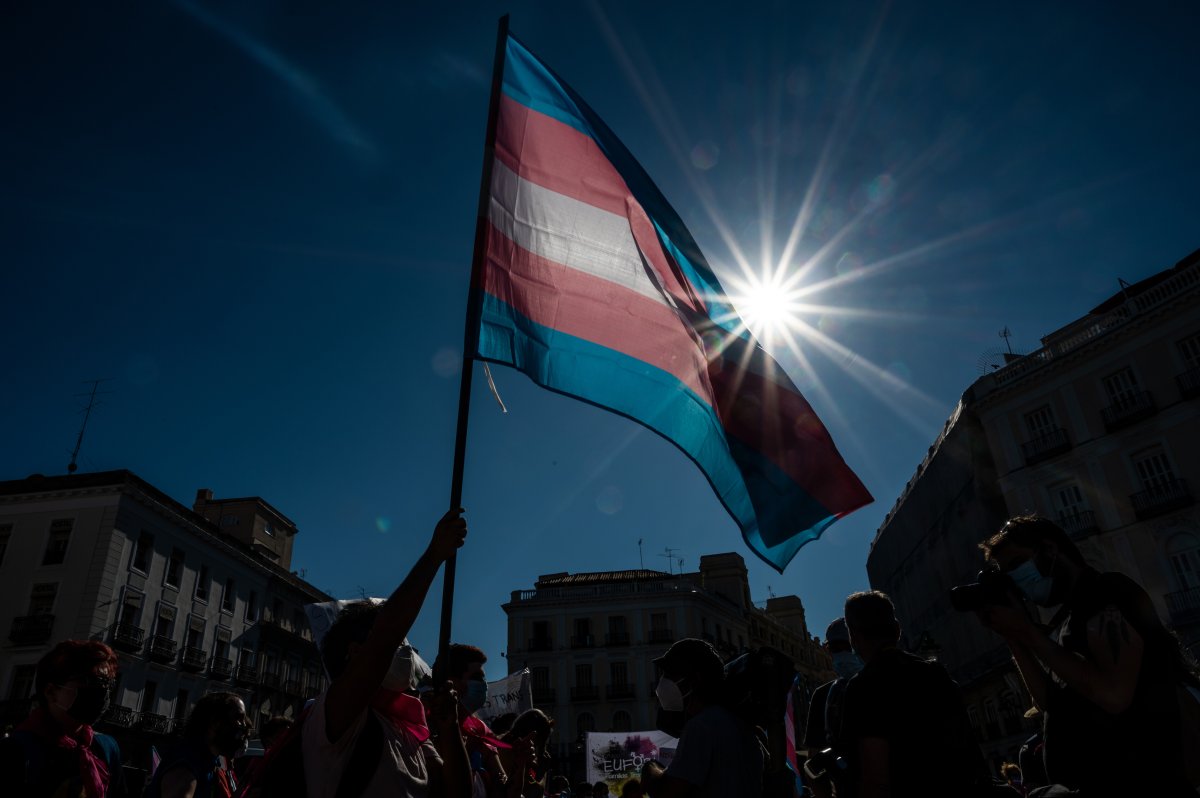 Demonstrator waving the trans flag attends a protest in Madrid on July 4, 2020, where the trans community demands a state law that will guarantee gender self-determination.