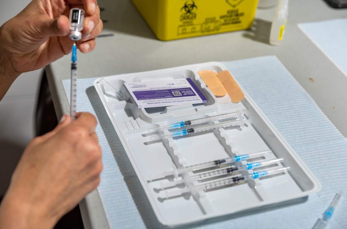 File photo of vaccine lined up waiting to be administered.