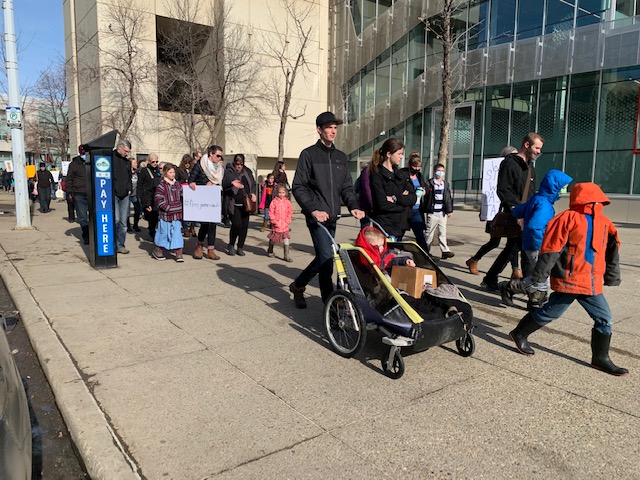 Supporters of GraceLife Church pastor James Coates outside the Edmonton courthouse on Thursday, March 4, 2021.