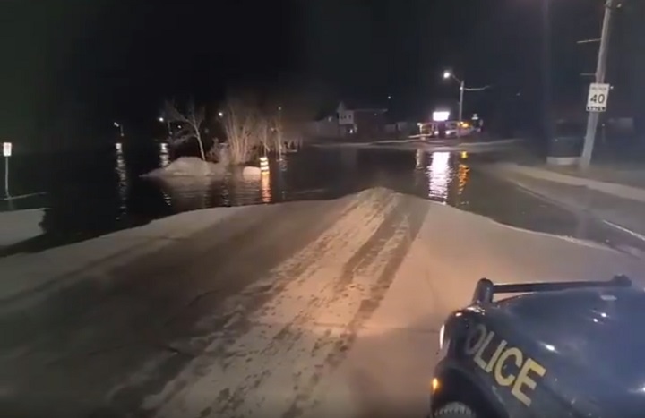 OPP tweeted out a video showing at least one road covered in water.