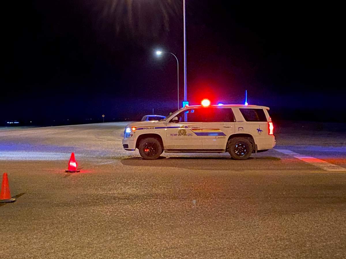 Police on the scene of a standoff in Granum on Tuesday, March 16. 