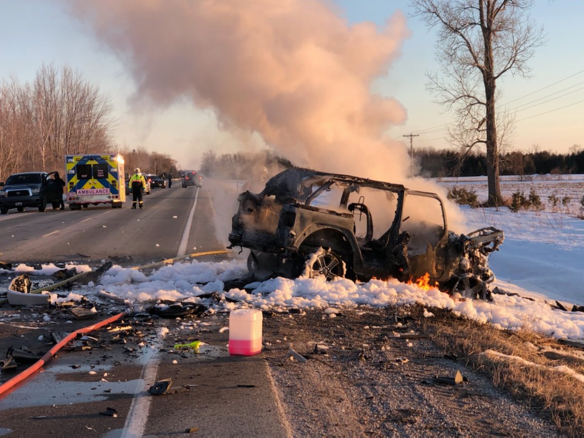 Smoke billows from a vehicle after it was involved in a serious crash in Huron County.