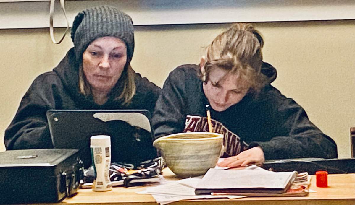 Rina Anglestad (left) working on homework with her daughter Alice at their Kitchen table during the pandemic