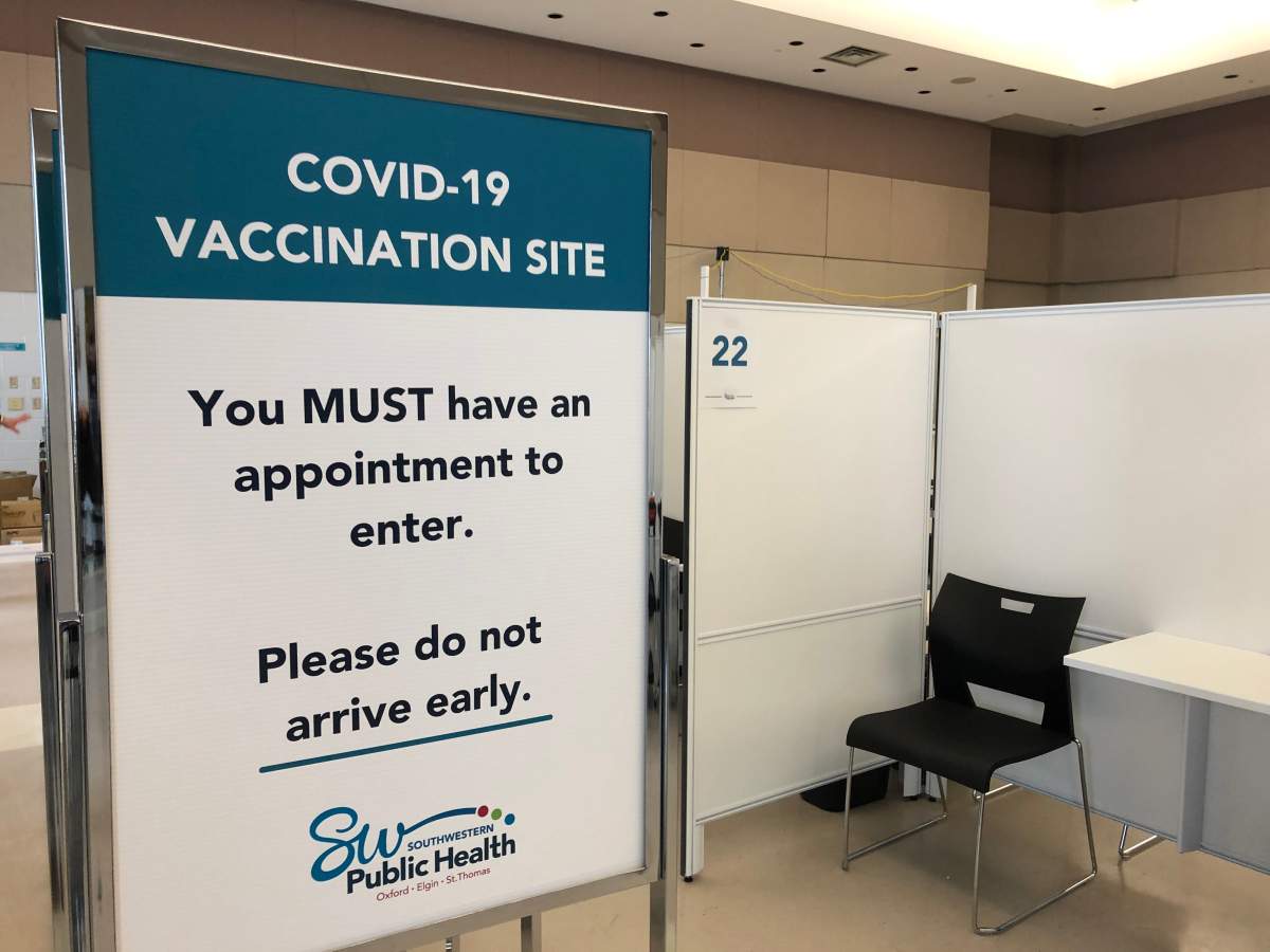 An empty cubicle awaits vaccine-seekers inside Woodstock's Goff Hall, a facility that's been transformed into a mass immunization clinic by Southwestern Public Health.