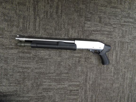 A firearm Manitoba Mounties say they seized during a pair of raids on Friday.